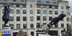 Διαδηλωτές γκρέμισαν  άγαλμα δουλέμπορου  Το έριξαν σε ποτάμι